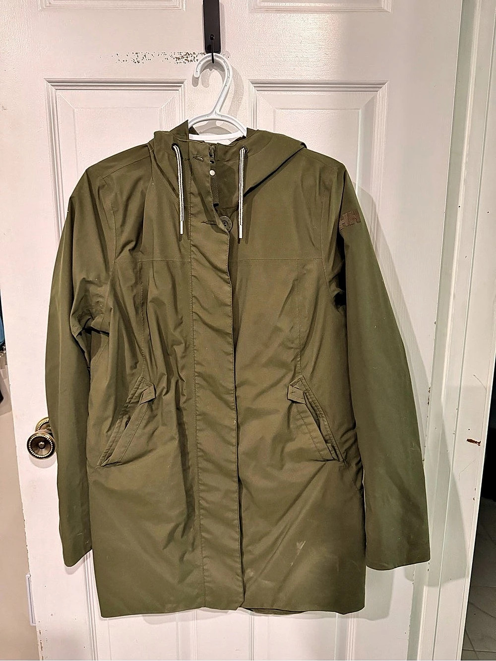 Helly Hansen woman’s Hooded Jacket in Green Size Large Like New
